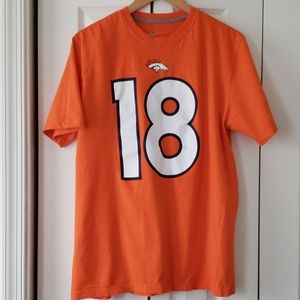 Nike manning tee shirt